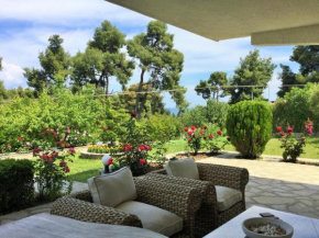 Green, White & Guest Houses by Dimitrios Ballas in Kriopigi, Halkidiki, Greece
